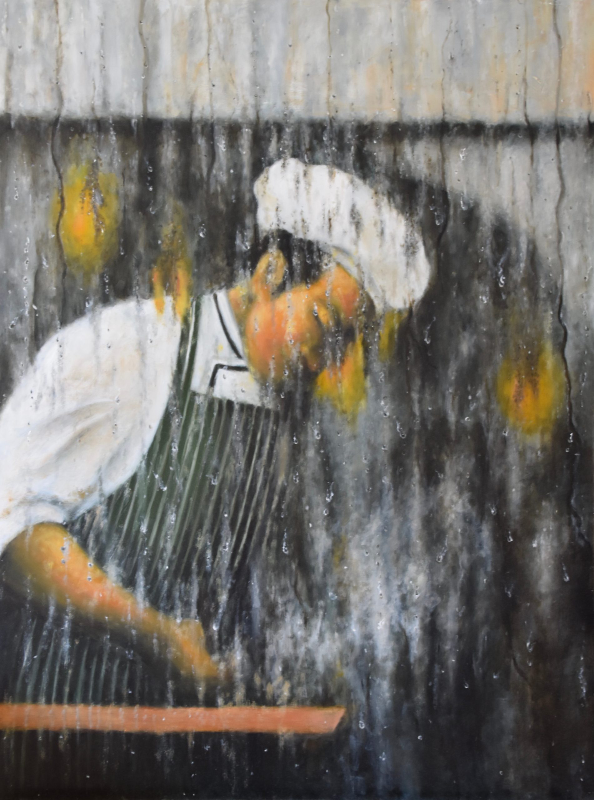 Chef behind the shop window